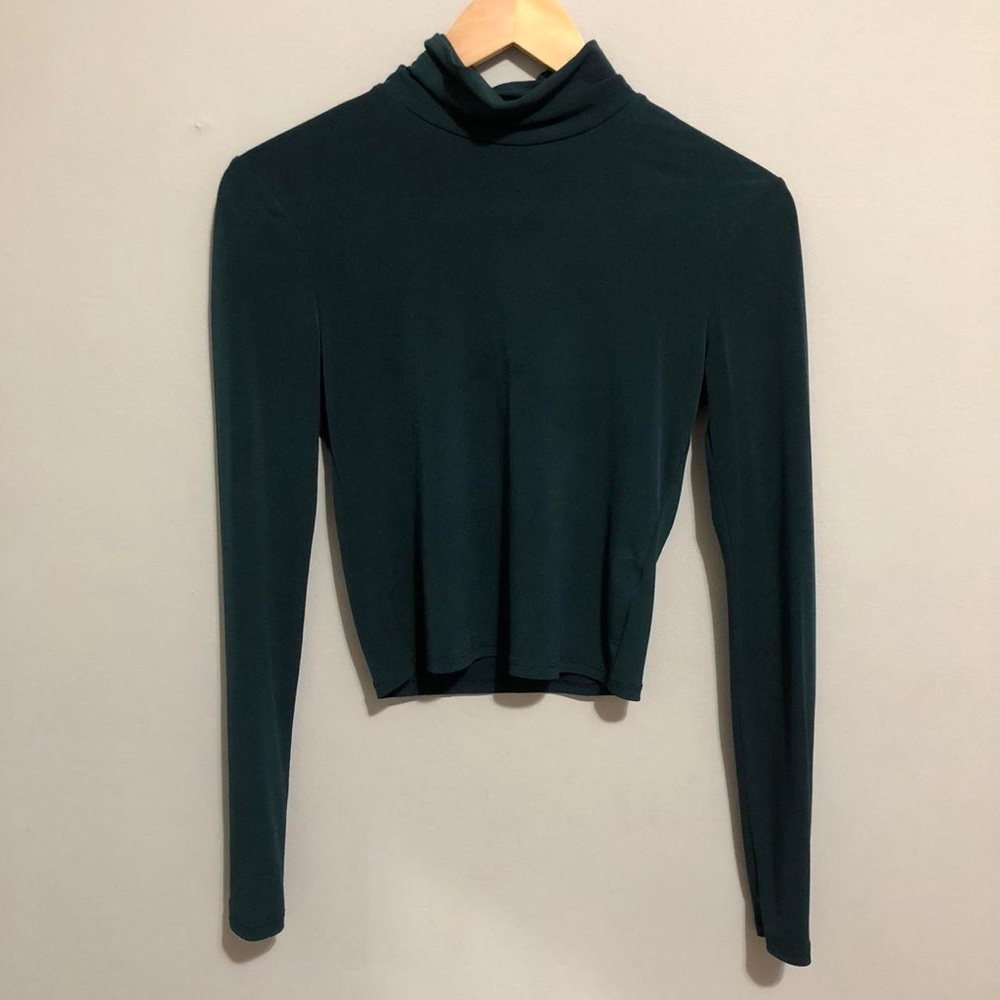 Dark green tight turtleneck long sleeve top